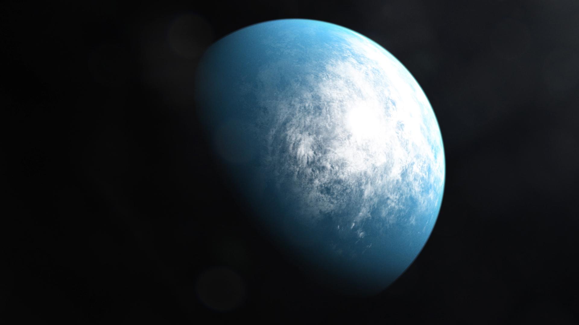 赤色矮星TOI-700と周囲を公転する惑星の公式想像図